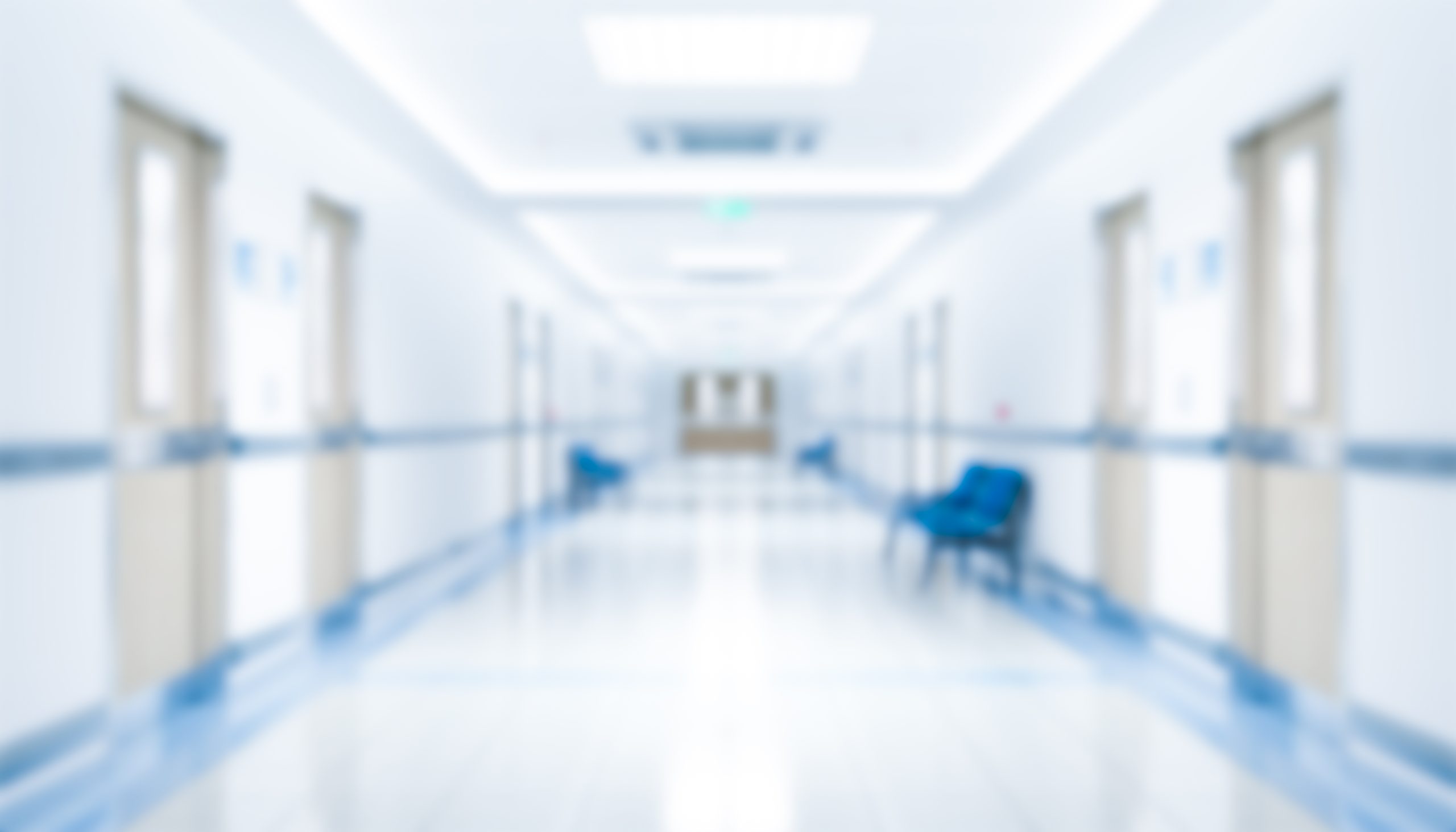Long,Hospital,Bright,Corridor,With,Rooms,And,Seats,3d,Rendering